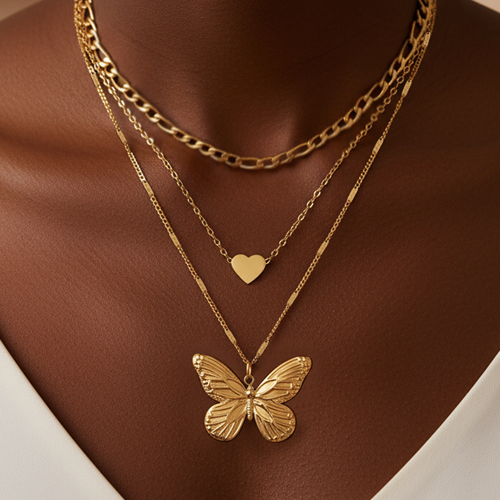 Coleção Íris - colar multicamadas borboleta & coração dourado premium